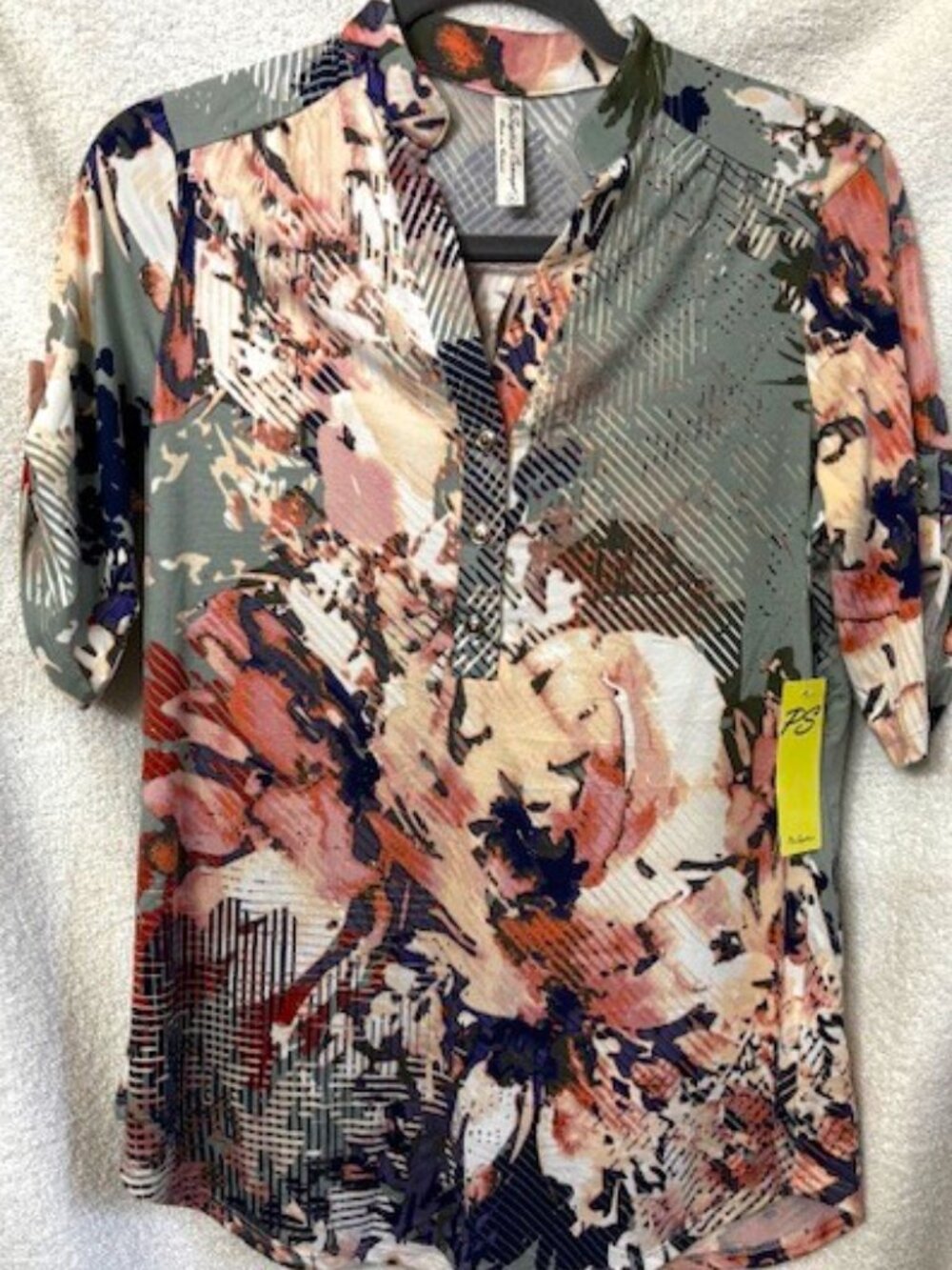Per Seption short sleeve casual blouse in a multi color print NWT Size S